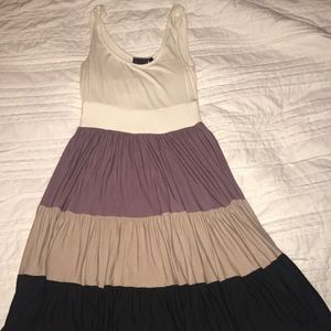 Off white and multi color purple strapless dress.